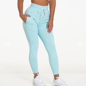 NVGTN sea foam green joggers